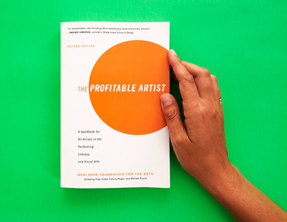 Hand by right side of the book cover on a neon green background.