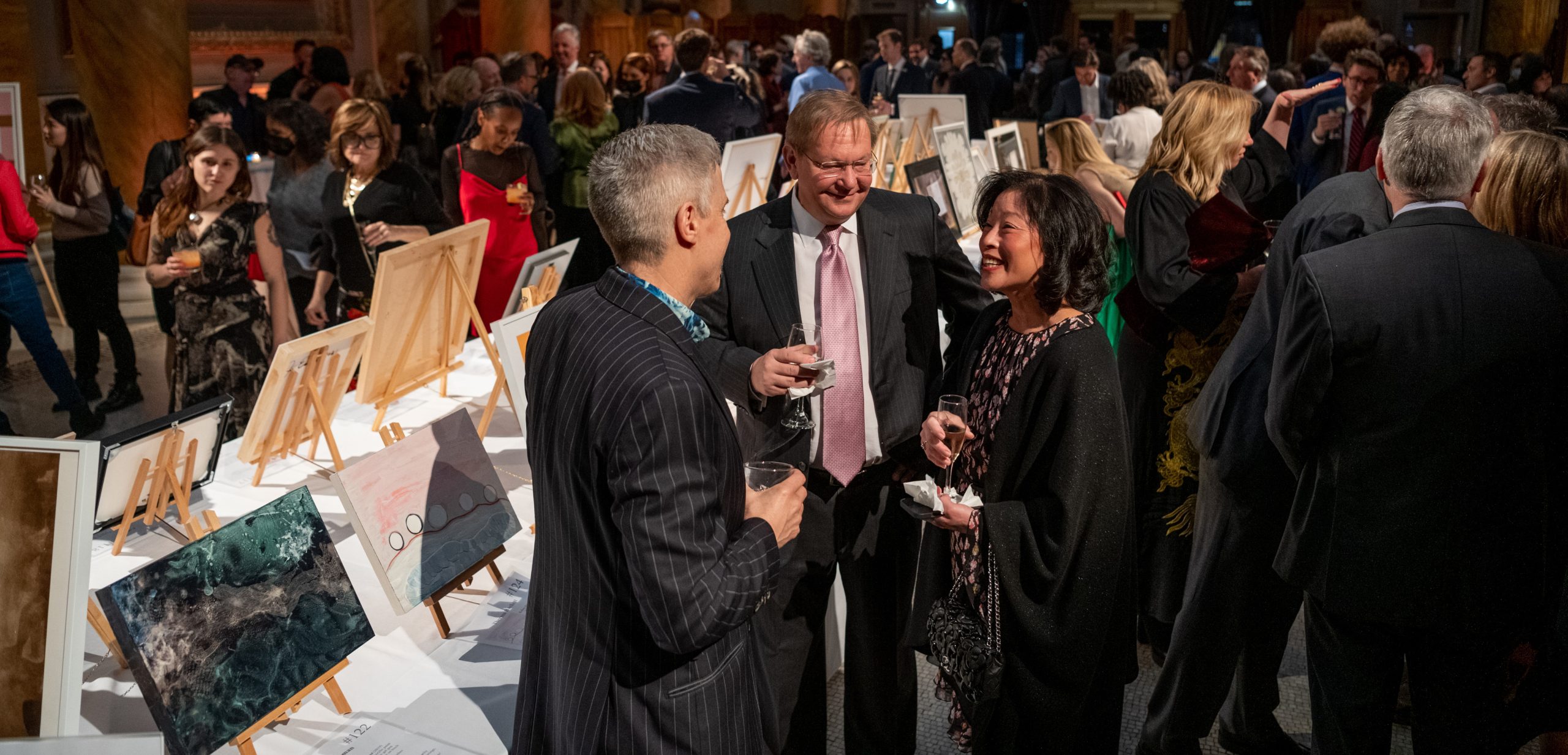 Guests enjoying the art at NYFA's 2022 Hall of Fame Benefit